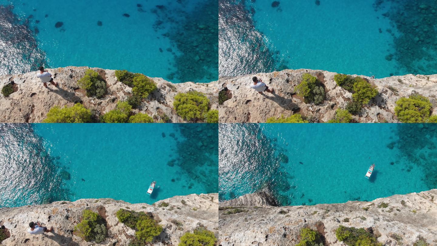 4k视频无人机希腊Zakynthos悬崖附近的无人机操作员