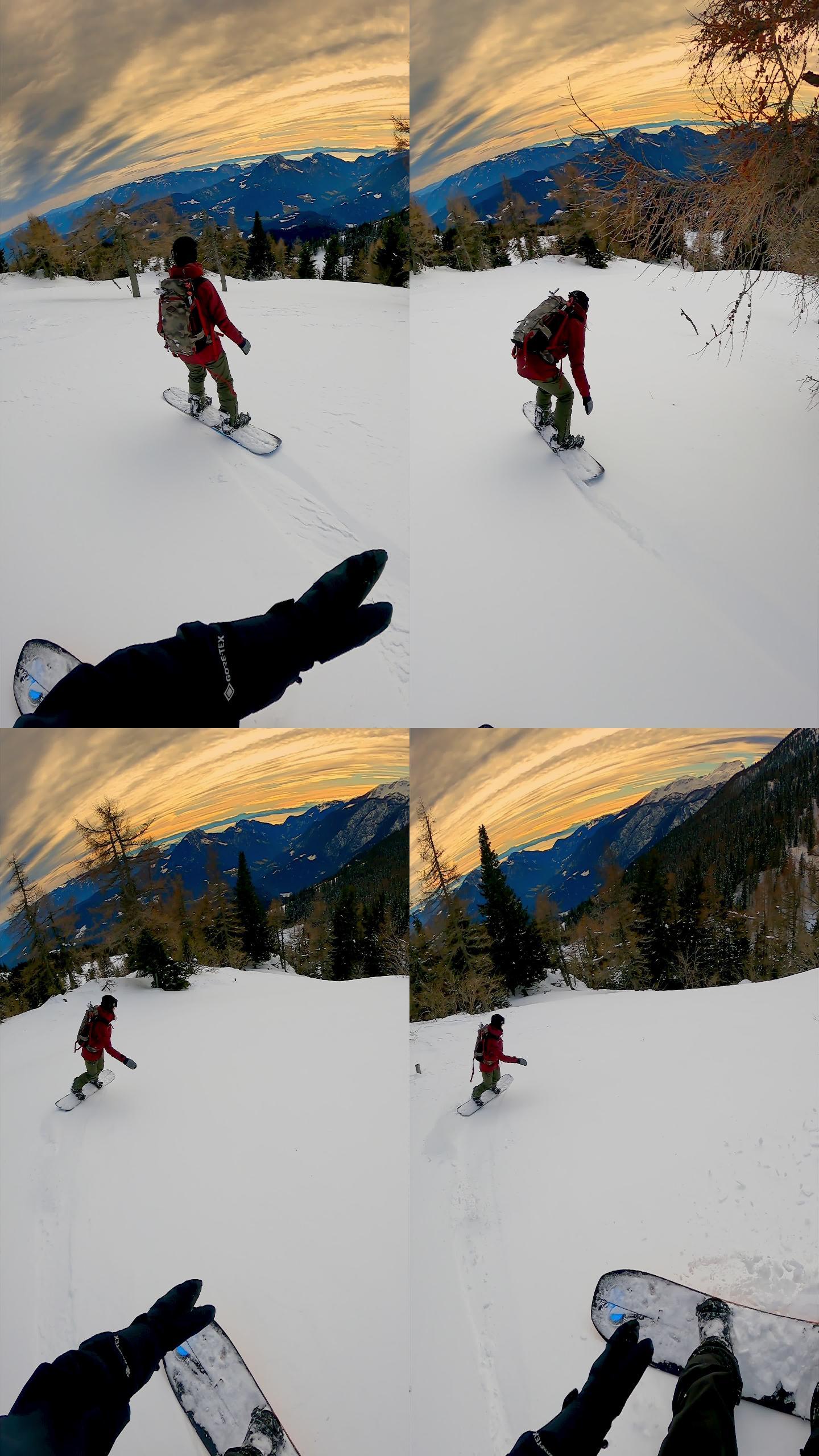 垂直视频POV拍摄的两名自由式滑雪板运动员在山下的树木之间雕刻