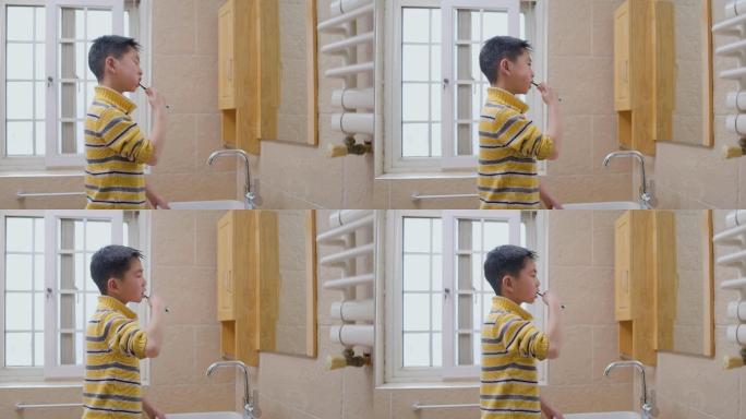 小男孩在浴室刷牙洗漱洗刷生活习惯
