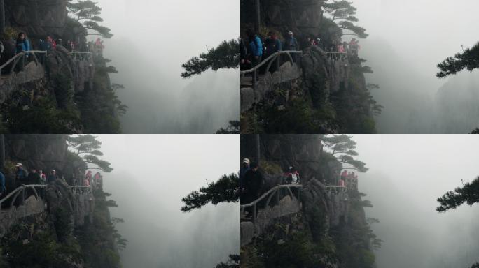 中国黄山黄山人们走在山顶小路上