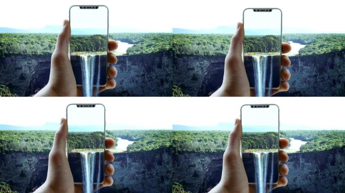 增强现实。漂亮的风景锁在智能手机里。瀑布从屏幕上倾泻而出