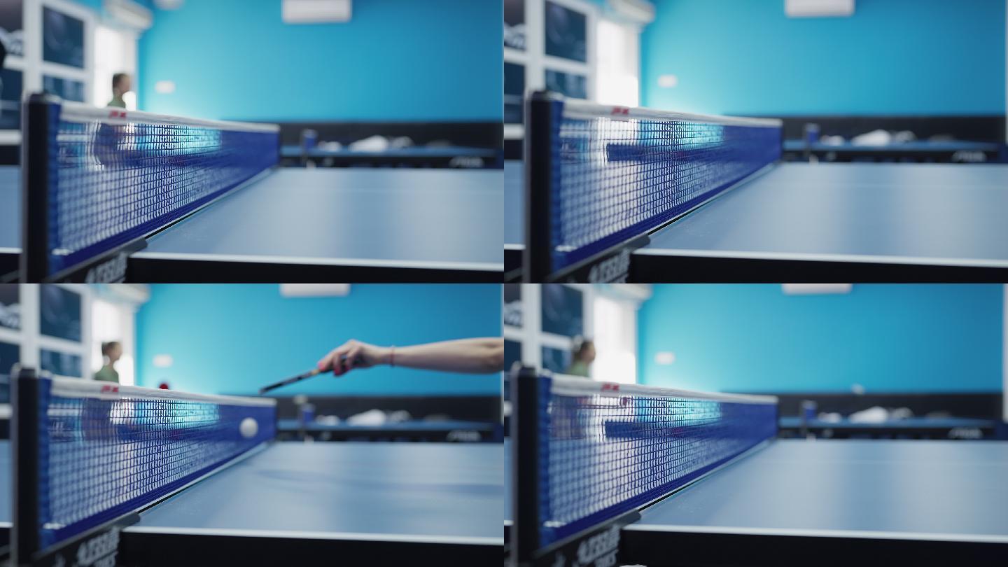 比赛中乒乓球网的特写镜头