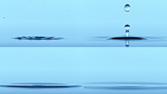 水滴落在水面上，形成另一个水滴