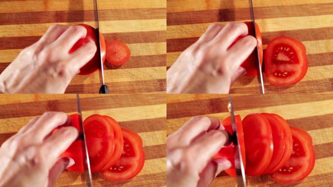 女人手切西红柿