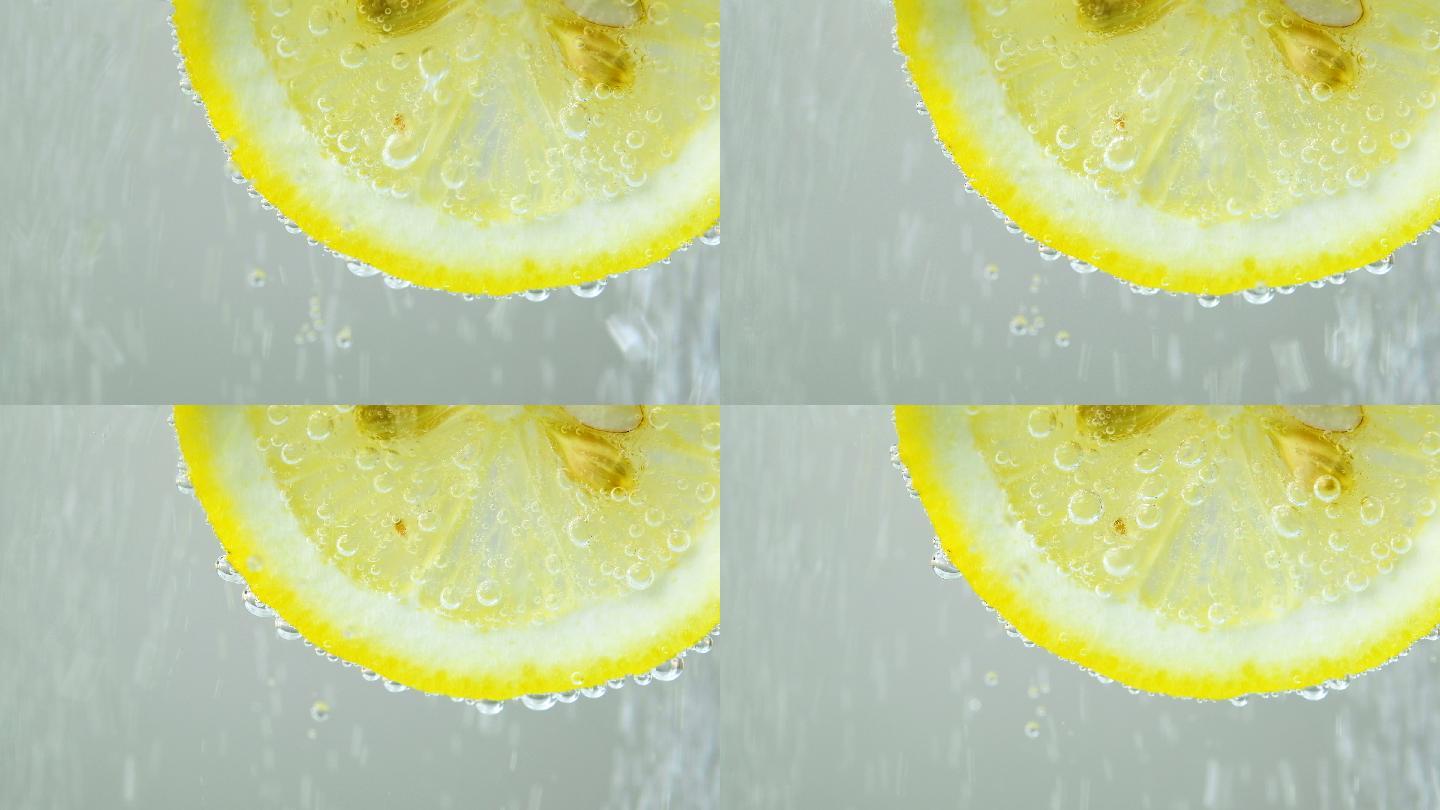 柠檬滴入起泡水、果汁点心