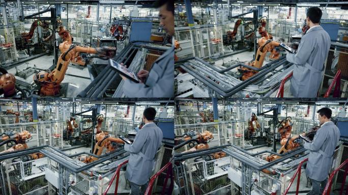 CS工业机器人的工作过程由一名亚洲男性工程师监督