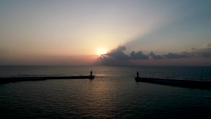 航拍海南三沙永兴岛渔港夕阳