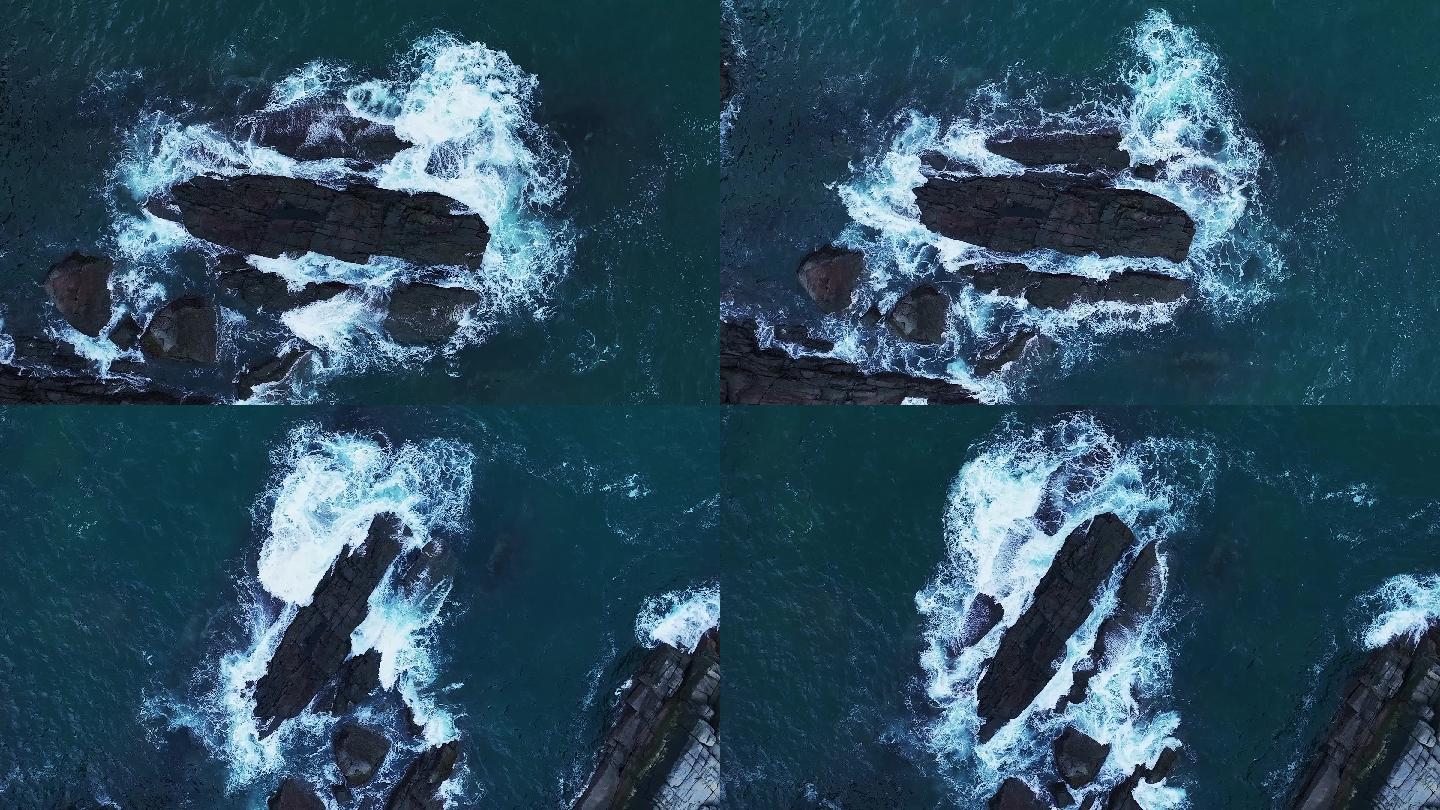 海浪拍击岩石航拍视角