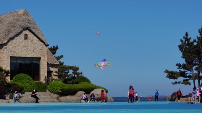 风筝广场海草房