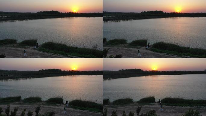 山东济南：鹊山龙湖湿地日落景色如画