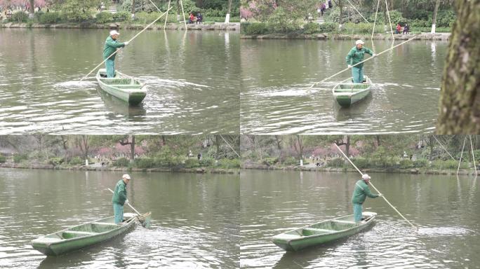 清道夫 老人 划船 清理 打捞 湖水 湖