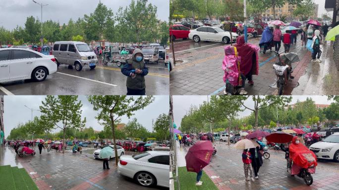 下雨天学校门口家长接送学生