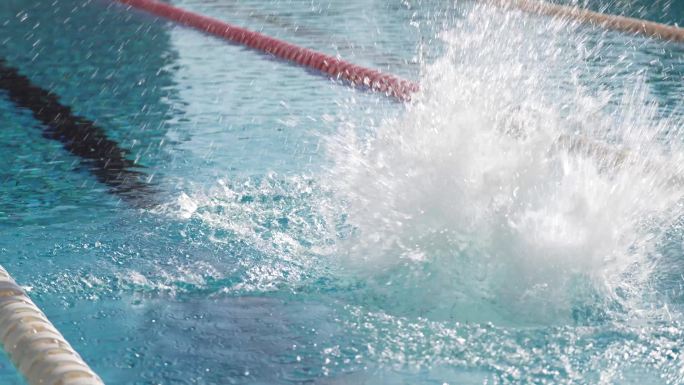 游泳训练馆运动员跳水游泳4K升格+航拍