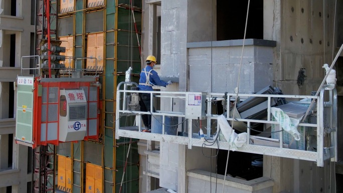 建筑工人高空作业外装小区建设建楼盖楼