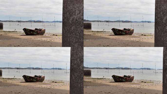 海边沙滩废弃的渔船