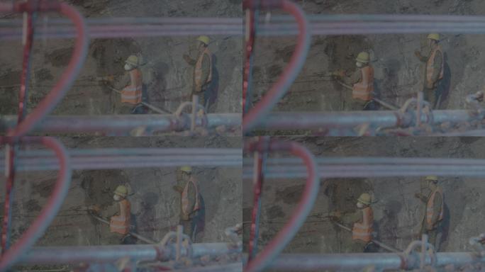 隧洞电钻爆破工人施工