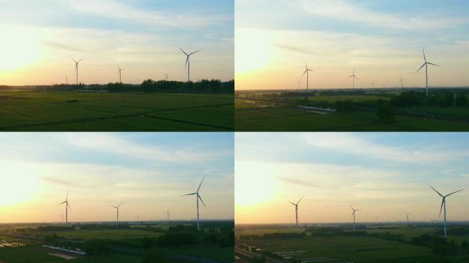 夕阳下麦田风力发电绿色环保唯美风车碳中和