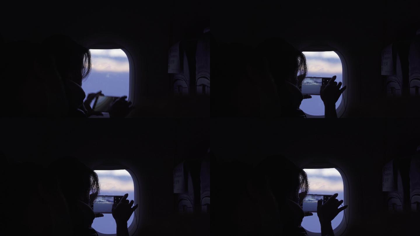 《4K超清》飞机飞过天空乘客看向外面拍照