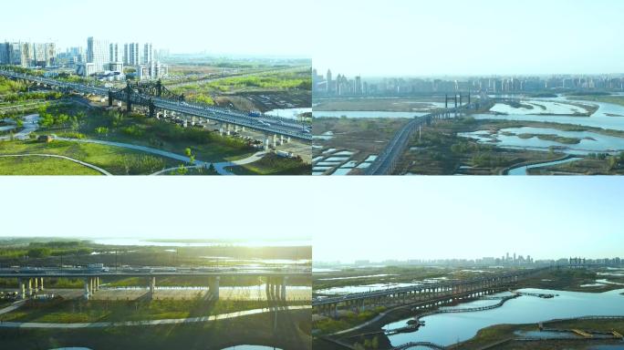 哈尔滨城市航拍阳明滩大桥日出日落车辆行驶