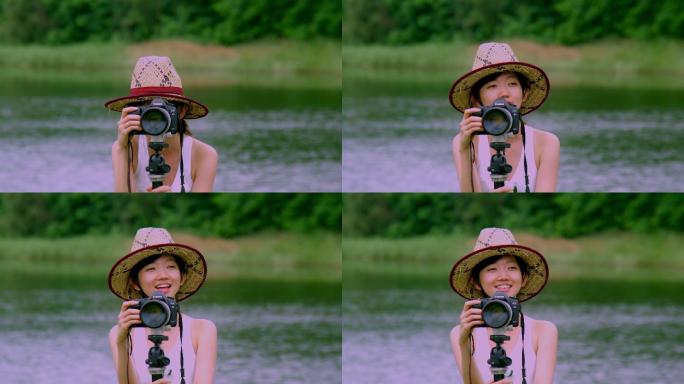 在湿地公园湖边拍摄的女孩