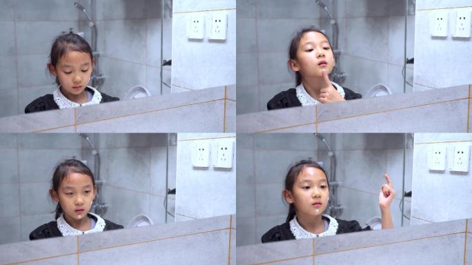 在卫生间洗脸的中国女孩