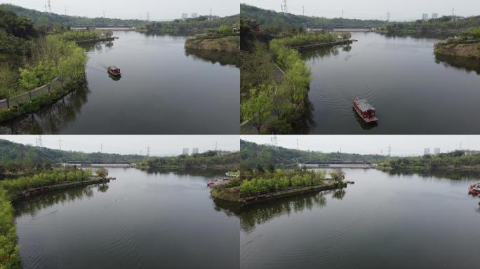 低空航拍重庆园博园湖中小船划过唯美镜头