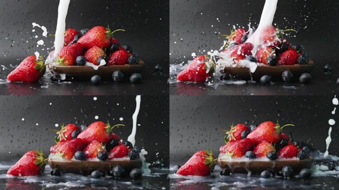 慢镜头拍摄牛奶冲洗碗里新鲜有机爆浆水果