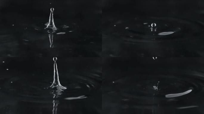 慢镜头拍摄夜晚一滴水滴入水面唯美创意视频
