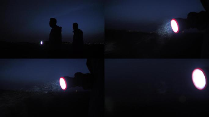 男人行走在乡间夜路上4K高速摄影