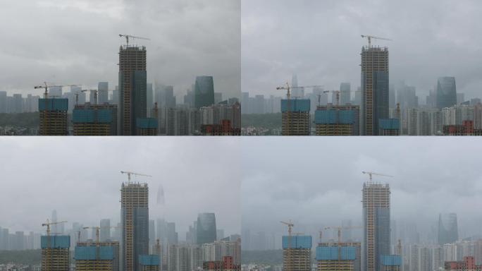 暴雨中深圳中心区雨雾和还在施工的塔吊延时