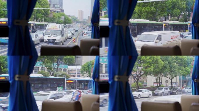 大巴车行驶窗外城市街景-旅行文艺
