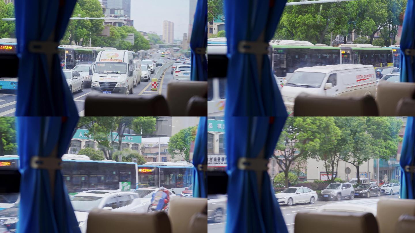 大巴车行驶窗外城市街景-旅行文艺