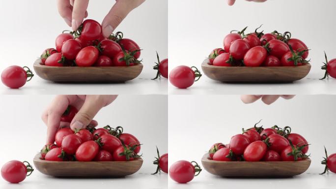 择取碗中新鲜有机小番茄