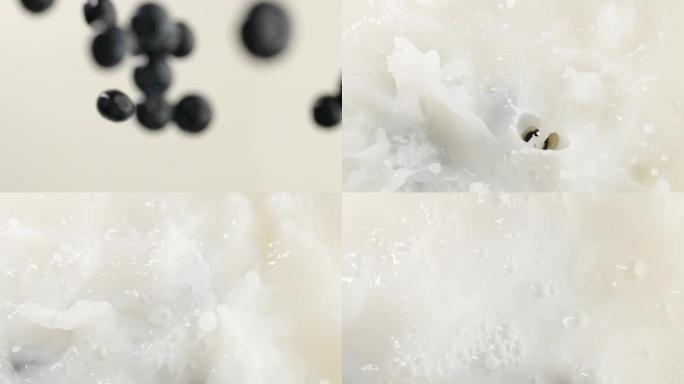 慢镜头拍摄新鲜爆浆蓝莓落入牛奶创意视频
