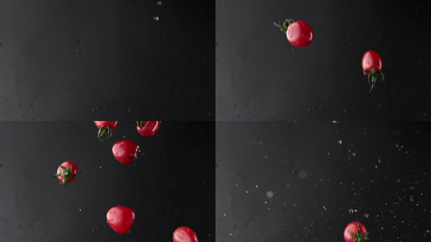 慢镜头拍摄新鲜爆浆小番茄落入水中创意视频