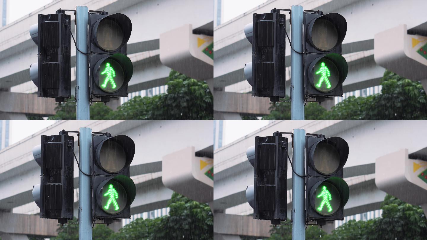 4K正版-下雨天的人行道交通信号灯-绿灯