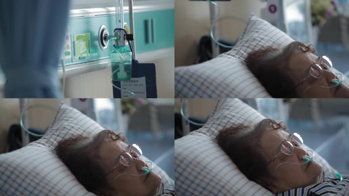 病人躺在病床上吸氧