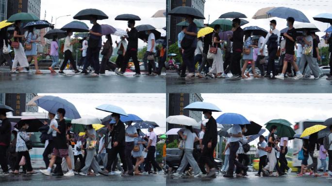 4K正版-下雨天撑伞过马路的行人