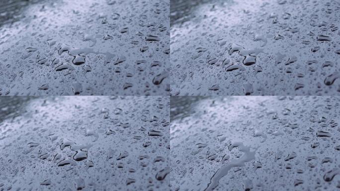 4K正版-下雨天雨水落在玻璃上