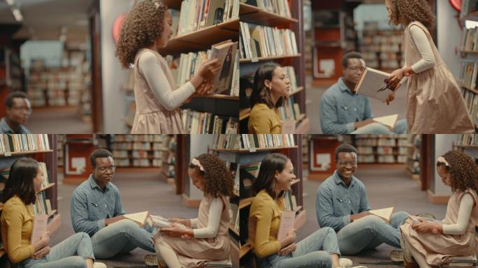 年轻的混血儿夫妇在图书馆看书时和女儿在一起。