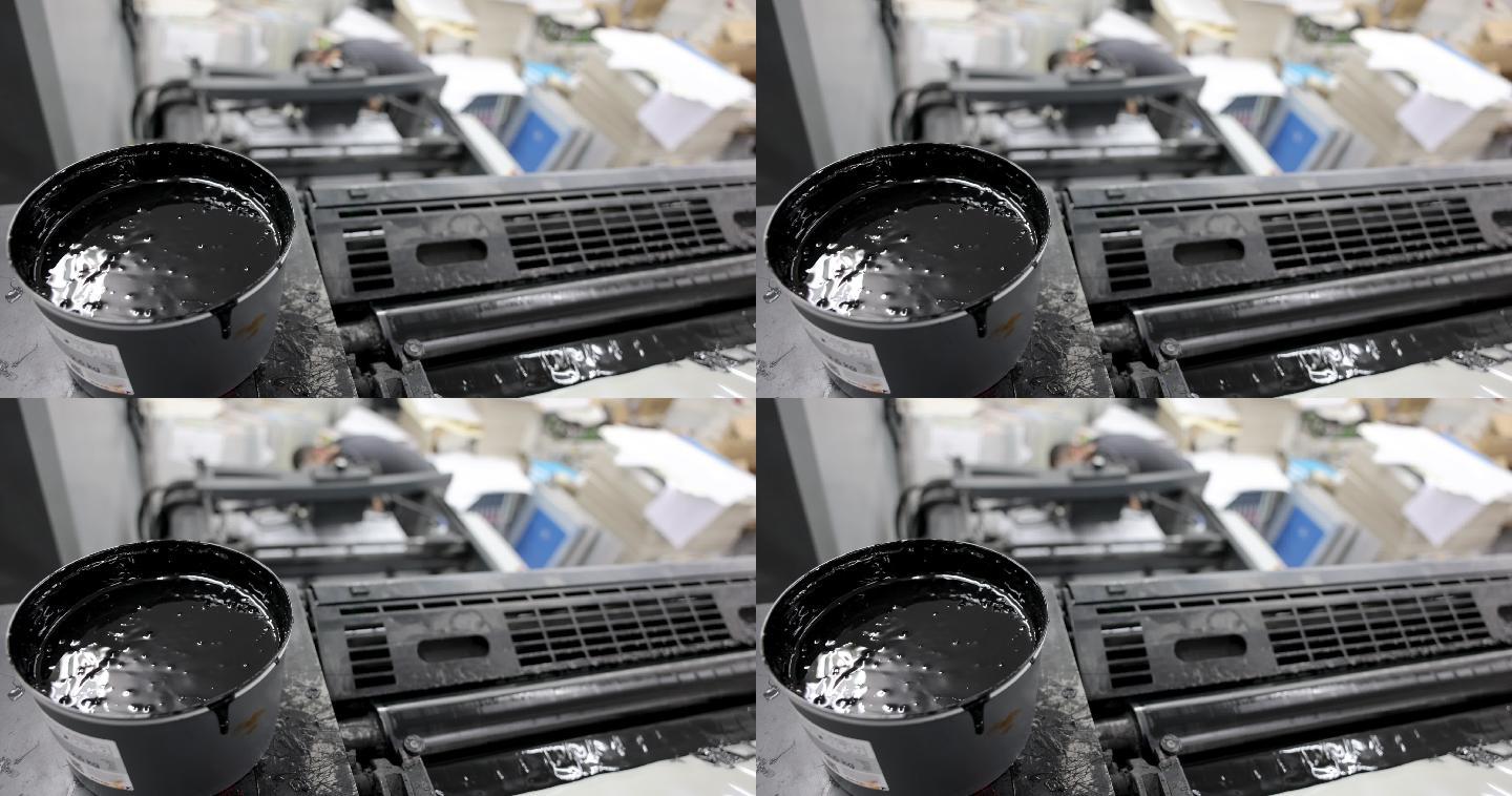 在印刷机上用黑色墨水对桶进行特写