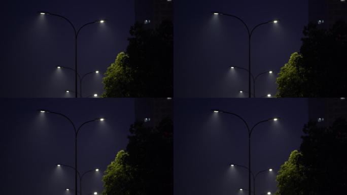 城市道路路灯灯光雾气水气