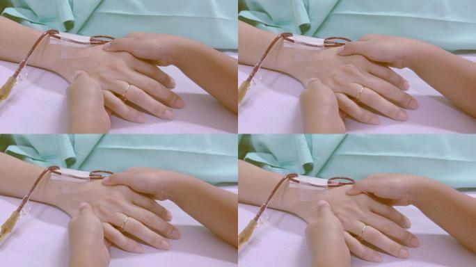 4k：女儿在病床上牵着母亲的手