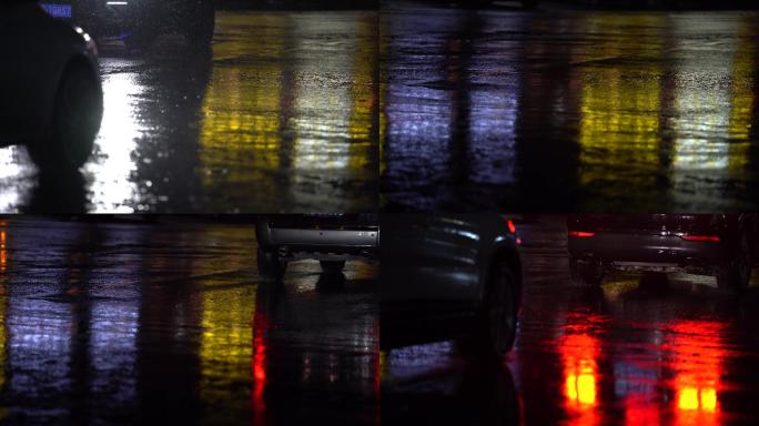 大雨暴雨夜晚城市道路路面雨水车辆车灯
