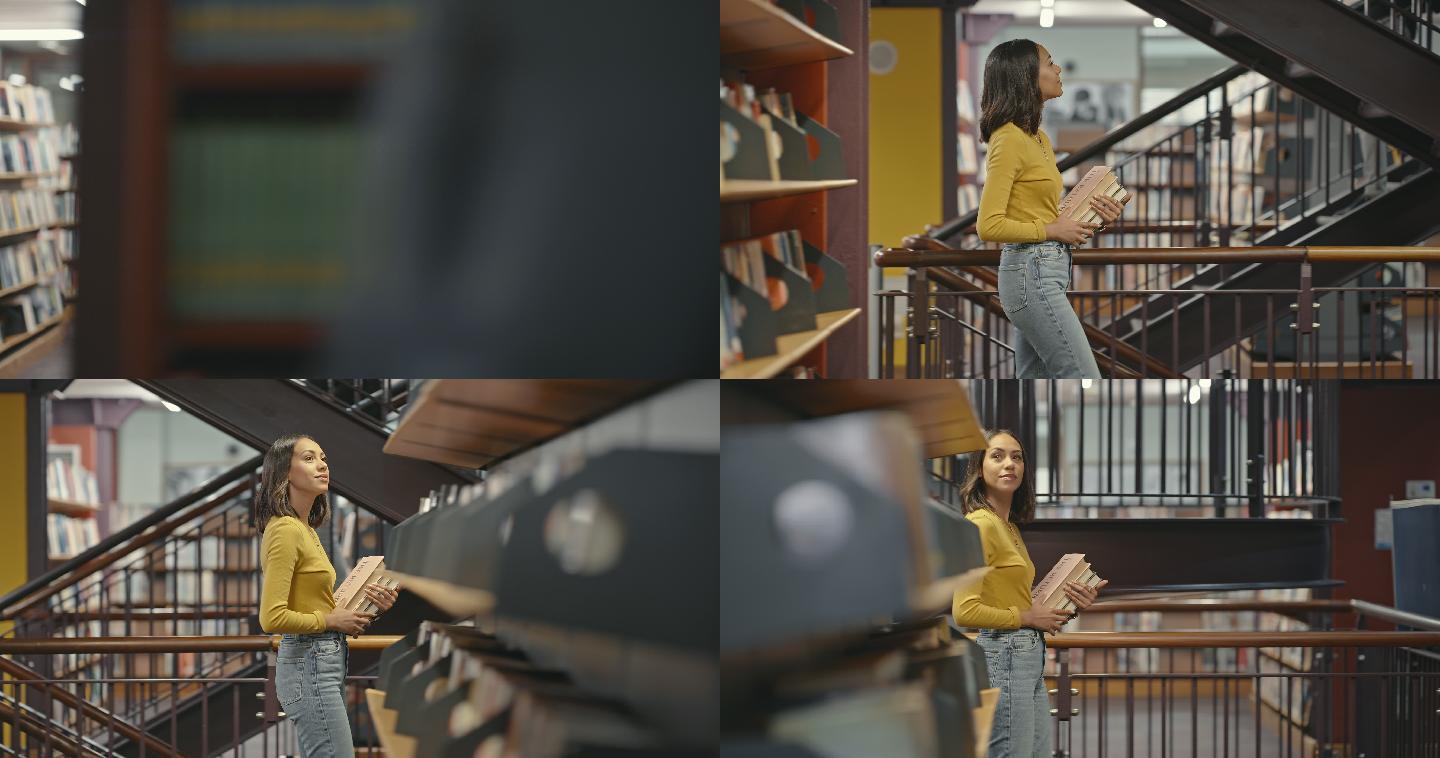 一个年轻的学生一边走一边在图书馆里寻找另一本书。美丽的女人在收集书籍。