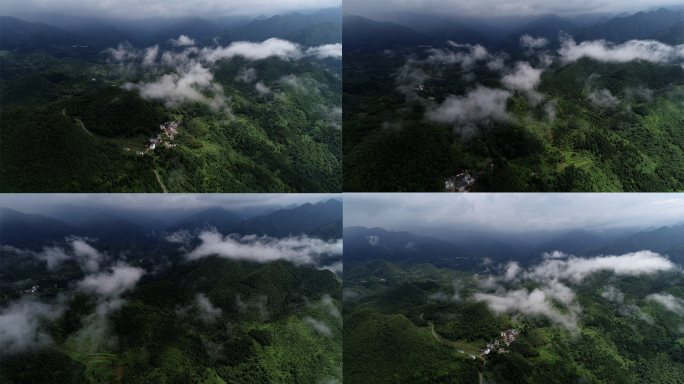 航拍山间白云人家大山