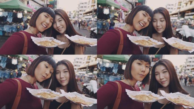 亚洲朋友在考新路拍了一张泰国街头美食的照片。