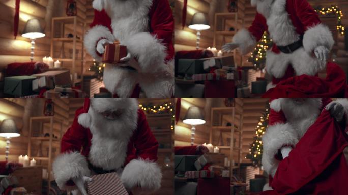 圣诞老人把许多礼物装进他的红口袋的特写镜头，他带着圣诞装饰品在办公室里