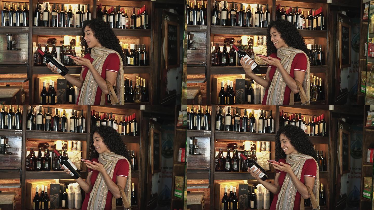 女性购物者在决定购买葡萄酒时使用手机