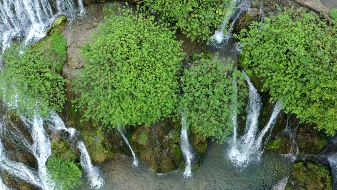 航拍旅游绿色生态河流瀑布丛林探险